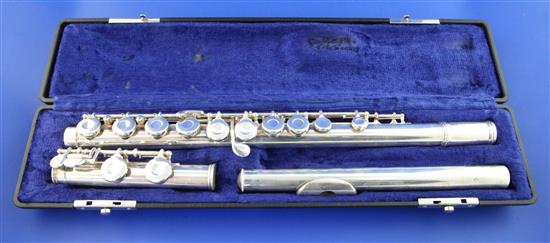 A cased American Gemeinhardt silver three section flute, 26.25in.